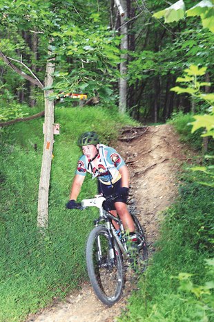 Around 200 bicyclists participated in the 2014 Cranky Monkey aboard Marine Corps Base Quantico on Aug. 16, 2014. The Cranky Monkey is a 8.5-mile mountain biking race pitting riders of similiar skills, ages and gender. Beginners raced in waved once around the course. Intermediate riders made two laps and the experienced riders took three. (Photos by David M. White/Released)
