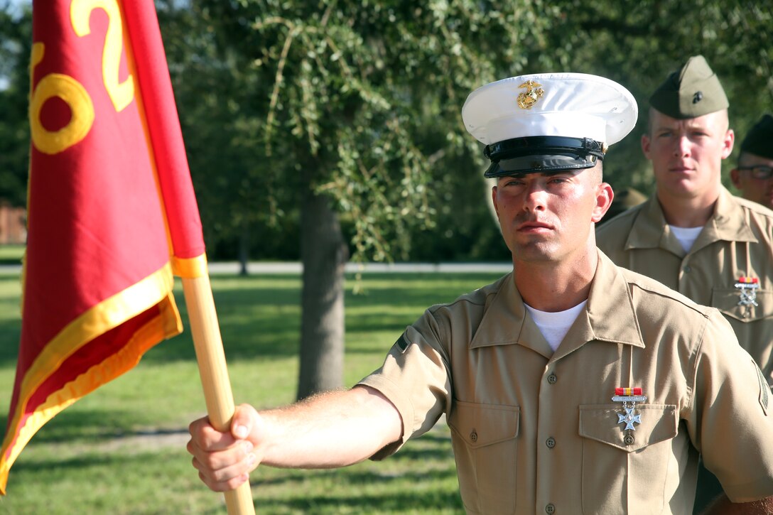 Pfc. Jacob A. Dougherty, honor graduate of platoon 3062, awaits graduation at Marine Corps Recruit Depot Parris Island, S.C., Aug. 22, 2014. Doughtery, a Savannah, Ga. native, was recruited from Recruiting Sub Station Statesboro, Recruiting Station Jacksonville. Recruit training signifies the transformation of a civilian to a United States Marine. Upon graduation, the newly-minted Marines will receive ten days of leave before attending the School of Infantry East, Camp Gieger, N.C. The Marines will be trained in basic infantry skills to ensure Marines are combat-ready. (U.S. Marine Corps Photo by Cpl. Stanley Cao)