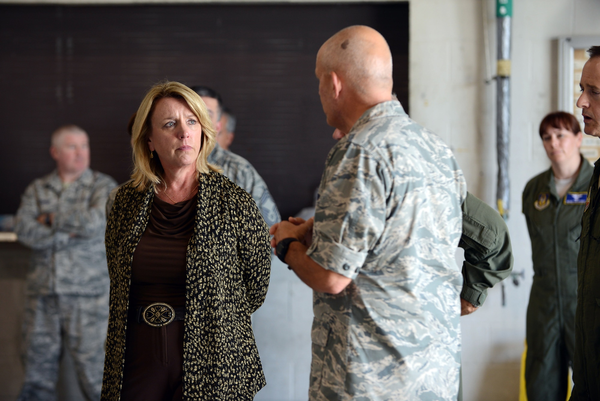 Secretary of the Air Force Deborah Lee James receives a briefing from Col. Kelly Scott Aug. 21, 2014, during a tour of the 461st and 116th Air Control Wings at Robins Air Force Base, Ga. During her tour of Robins Air Force Base, James also visited Air Force Reserve Command, the 78th Air Base Wing and the Warner Robins Air Logistics Complex. Scott is the 461st Maintenance Group commander. (U.S. Air Force photo/Tommie Horton)