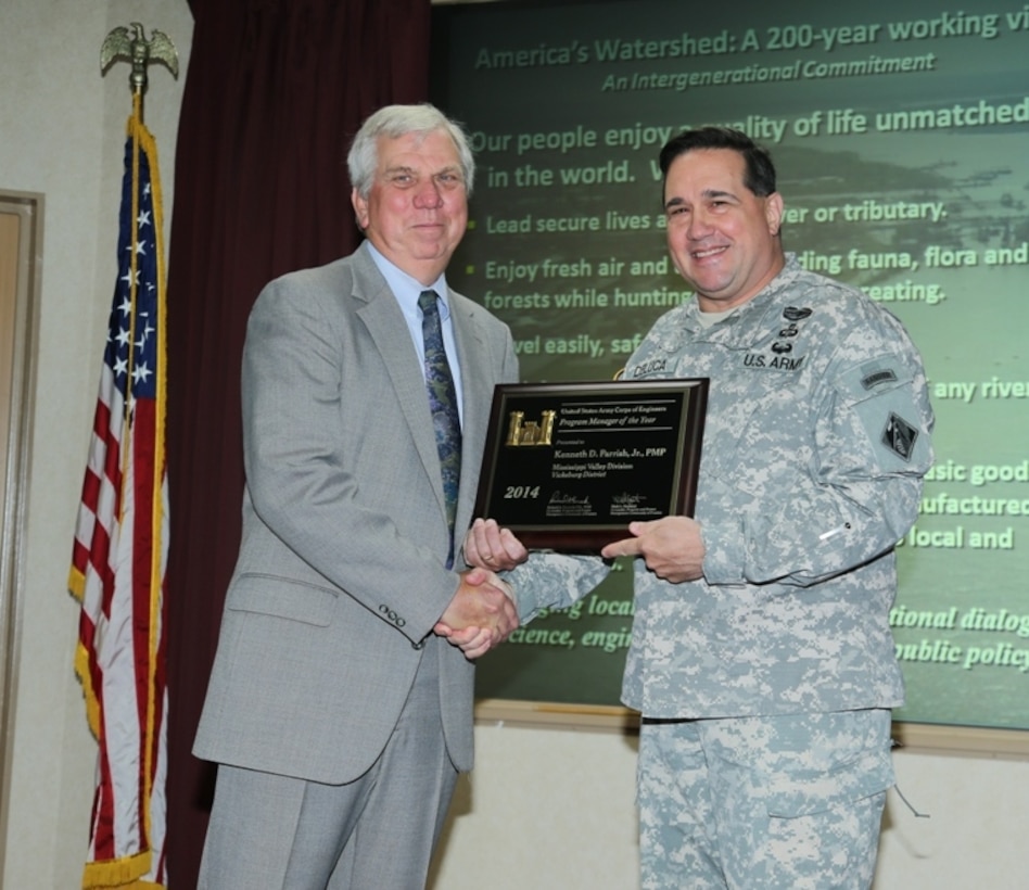 Vicksburg, Miss…The U.S. Army Corps of Engineers, Vicksburg District (District), is proud to announce Kenneth D. Parrish, Jr., has been selected as the U. S. Army Corps of Engineers 2014 Program Manager of the Year. 

Parish serves as a Regional Program Manager of the four hundred and sixty mile Mississippi River Levee System (MRL). The MRL successfully performed as designed during the Mississippi River Flood of 2011. Parrish has been the leader of the MRL team for almost twenty years, maintaining and managing the MRL projects prior to the 2011 Mississippi River Flood.  His leadership, experience and relationships with local levee boards and communities proved invaluable during the event. During the post-2011 levee system recovery efforts, Parrish was a subject matter expert and key member of technical teams tasked with repairing the damage of the 2011 flood.
