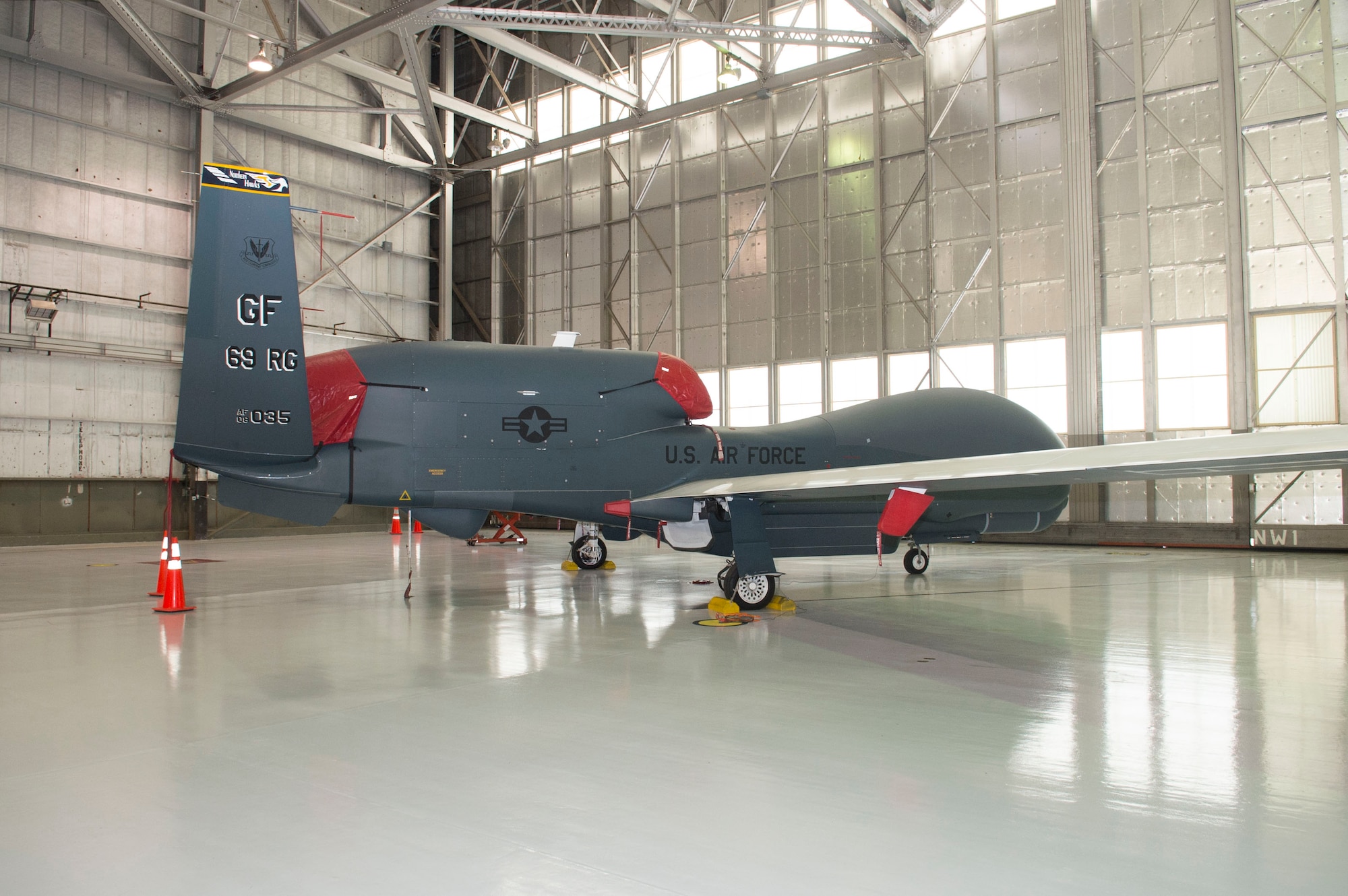 An RQ-4 Global Hawk Block 40 sits inside a hangar at at Edwards Air Force Base, Calif., Aug. 18, 2014. The 412th Test Wing's Global Vigilance Combined Test Force received a Global Hawk Block 40 Aug. 6, on loan from Air Combat Command.The aircraft, from Grand Forks Air Force Base, N.D., is joining the Block 20 and 40 aircraft at Edwards AFB to offer an additional platform for configuration-constrained testing, allowing the test force to balance their schedule. (U.S. Air Force photo/Jennifer Romo)
