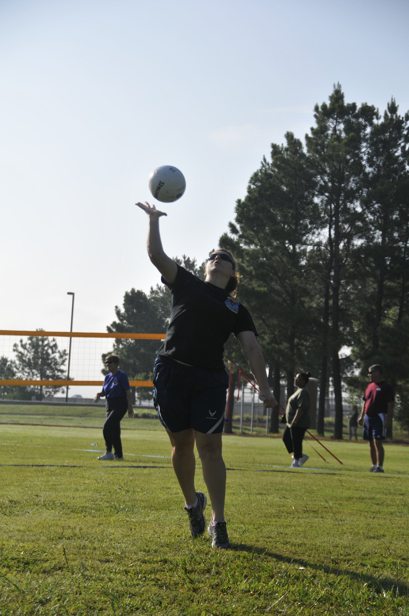 Members of the 188th Wing participate in a Wingman Day volleyball event held at Ebbing Air National Guard Base, Fort Smith, Arkansas, Aug. 2. The purpose of the event was to foster teamwork and cohesiveness in the unit. (U.S. Air National Guard photo by Staff Sgt. John Suleski/released)