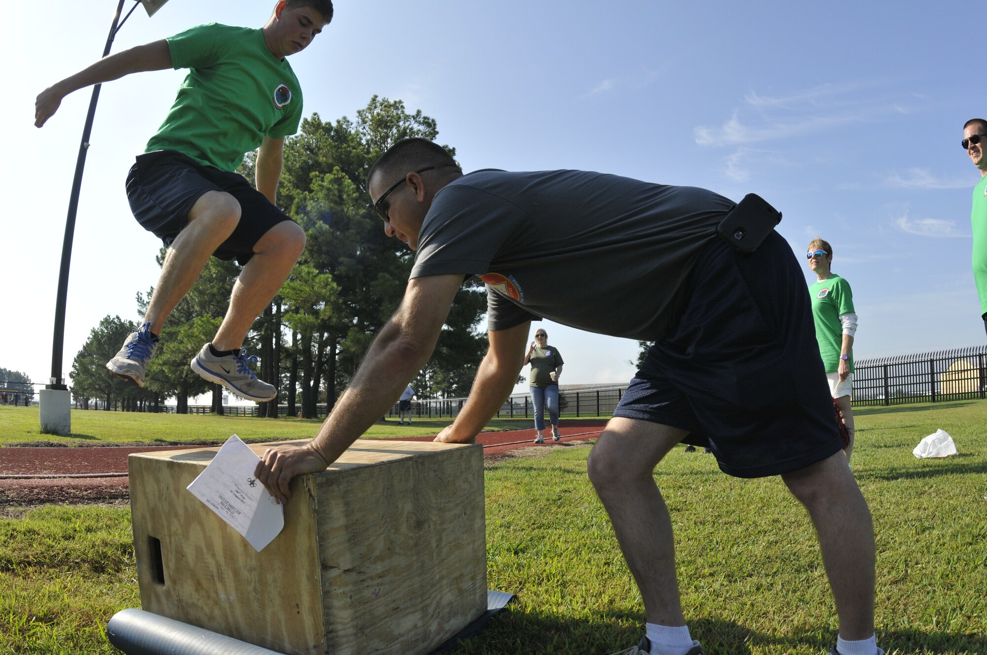 Members of the 188th Wing participate in a Wingman Day relay event held at Ebbing Air National Guard Base, Fort Smith, Arkansas, Aug. 2. The purpose of the event was to foster teamwork and cohesiveness in the unit. (U.S. Air National Guard photo by Staff Sgt. John Suleski/released)