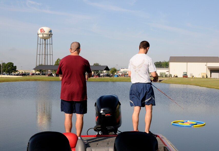 Master Sgt. Johnny Adams records Senior Airman Kristopher Shoffner’s score in a fishing pole casting contest during Wingman Day at the 188th Wing’s Ebbing Air National Guard Base Fort Smith, Arkansas, on Aug. 2, 2014. Adams is assigned to the 188th Operations Support Squadron and Shoffner is assigned to the 188th Communications Flight. (U.S. Air National Guard photo by Senior Airman Hannah Landeros/Released)