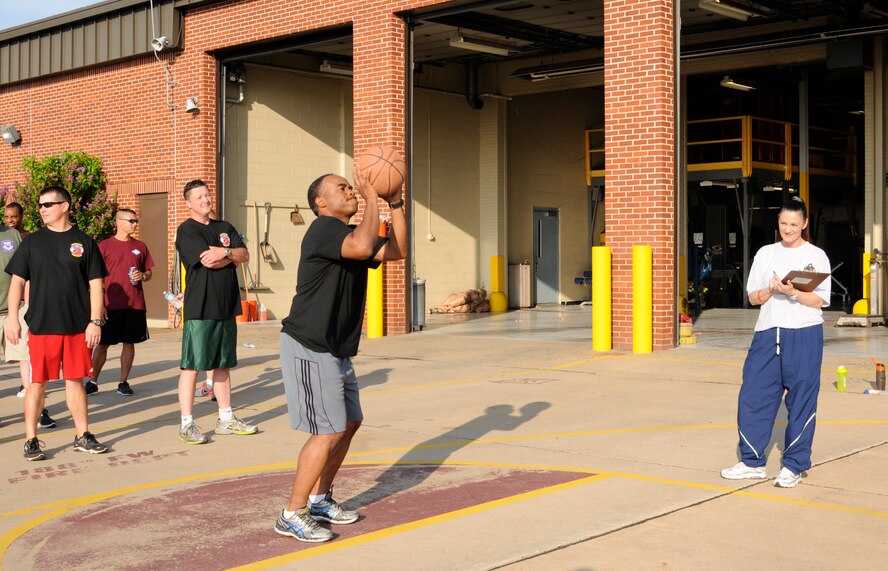 Master Sgt. Cedric Bausley participates in the free throw competition during Wingman Day at the 188th Wing’s Ebbing Air National Guard Base Fort Smith, Arkansas, on Aug. 2, 2014. Bausley is assigned to the 188th Security Forces Squadron. (U.S. Air National Guard photo by Senior Airman Hannah Landeros/Released)