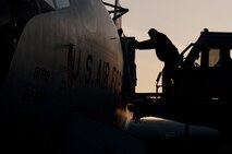 Tim Woodward an air freight specialist assigned to the 732nd Air Mobility Squadron loads cargo onto a U.S. Air Force KC-135 Stratotanker assigned to the 22nd Air Refueling Wing, McConnell Air Force Base, Kan., during RED FLAG-Alaska 14-3 Aug. 22, 2014, Eielson Air Force Base, Alaska. RF-A is a series of Pacific Air Forces commander-directed field training exercises for U.S. and partner nation forces, providing combined offensive counter-air, interdiction, close air support and large force employment training in a simulated combat environment. (U.S. Air Force photo by Tech. Sgt. Joseph Swafford Jr./Released)