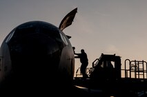 Tim Woodward an air freight specialist assigned to the 732nd Air Mobility Squadron loads cargo onto a U.S. Air Force KC-135 Stratotanker assigned to the 22nd Air Refueling Wing, McConnell Air Force Base, Kan., during RED FLAG-Alaska 14-3 Aug. 22, 2014, Eielson Air Force Base, Alaska. RF-A is a series of Pacific Air Forces commander-directed field training exercises for U.S. and partner nation forces, providing combined offensive counter-air, interdiction, close air support and large force employment training in a simulated combat environment. (U.S. Air Force photo by Tech. Sgt. Joseph Swafford Jr./Released)