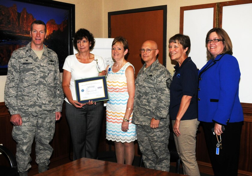 From left: Col. Mark Anderson, 188th Wing commander; Jennifer Thomas, vice president of ancillary services at Mercy Fort Smith; Shirley Bearden, Mercy employee and key volunteer with the 188th Airman and Family Readiness Office;  Lt. Col. Judith Mathewson, 188th Mission Support Group deputy commander; and Michelle Pike, 188th Airmen and Family Readiness manager. The Beardens honored Thomas with an ESGR Patriot Award for her exceptional support during Master Sgt. Bearden’s 2012 deployment to Afghanistan. (U.S. Air National Guard photo by Maj. Heath Allen/released)