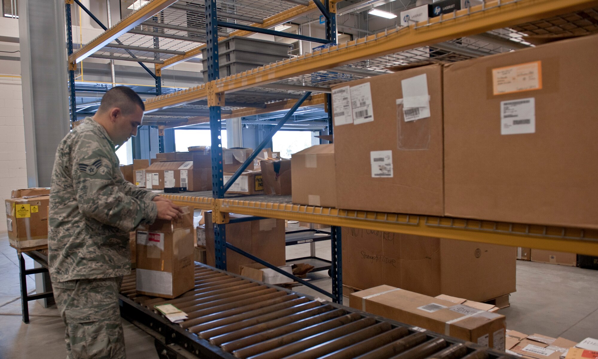 Senior Airman Matthew Stilwell, 1st Special Operations Logistic Readiness Squadron supply journeyman, verifies information for unserviceable equipment at Hurlburt Field, Fla., Aug. 22, 2014. Verifying label information is important to ensure that products are sent to the correct places. (U.S. Air Force photo/Senior Airman Krystal M. Garrett)    