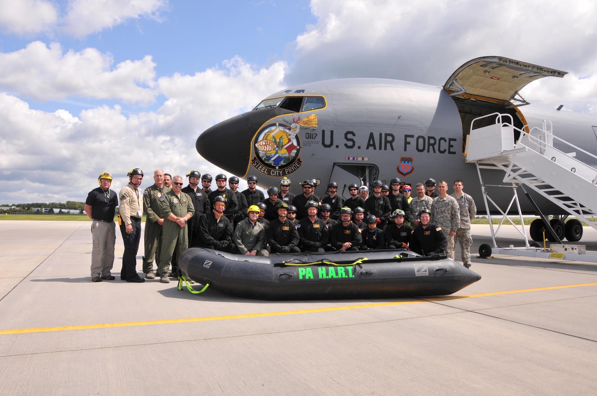 Pennsylvania Air and Army National Guardsmen from the 171st Air Refueling Wing, the 258th Air Traffic Control Squadron, a geographically separated unit of the 171st, and the 1-104th Attack Reconnaissance Battalion participate in a joint exercise with the Pennsylvania Emergency Management Agency (PEMA) at the John P. Murtha Cambria County Airport in Johnstown Pennsylvania, 15 August, 2014. This proof of concept exercise was to prove a KC-135 aircraft could land at the county airport and provide transportation for the Helicopter Aquatic Rescue Team (HART) personnel and their equipment along with Pennsylvania Army National Guardsmen and PEMA personnel. This proposed process could increase response time for emergency responders in the event of an emergency. It’s a historic event for the 258th as this is the first time a KC-135, based at the171st near Pittsburgh, will land at the county airport in Johnstown. (Pennsylvania Air National Guard Photo by Senior Airmen Nicole Luben / Released)