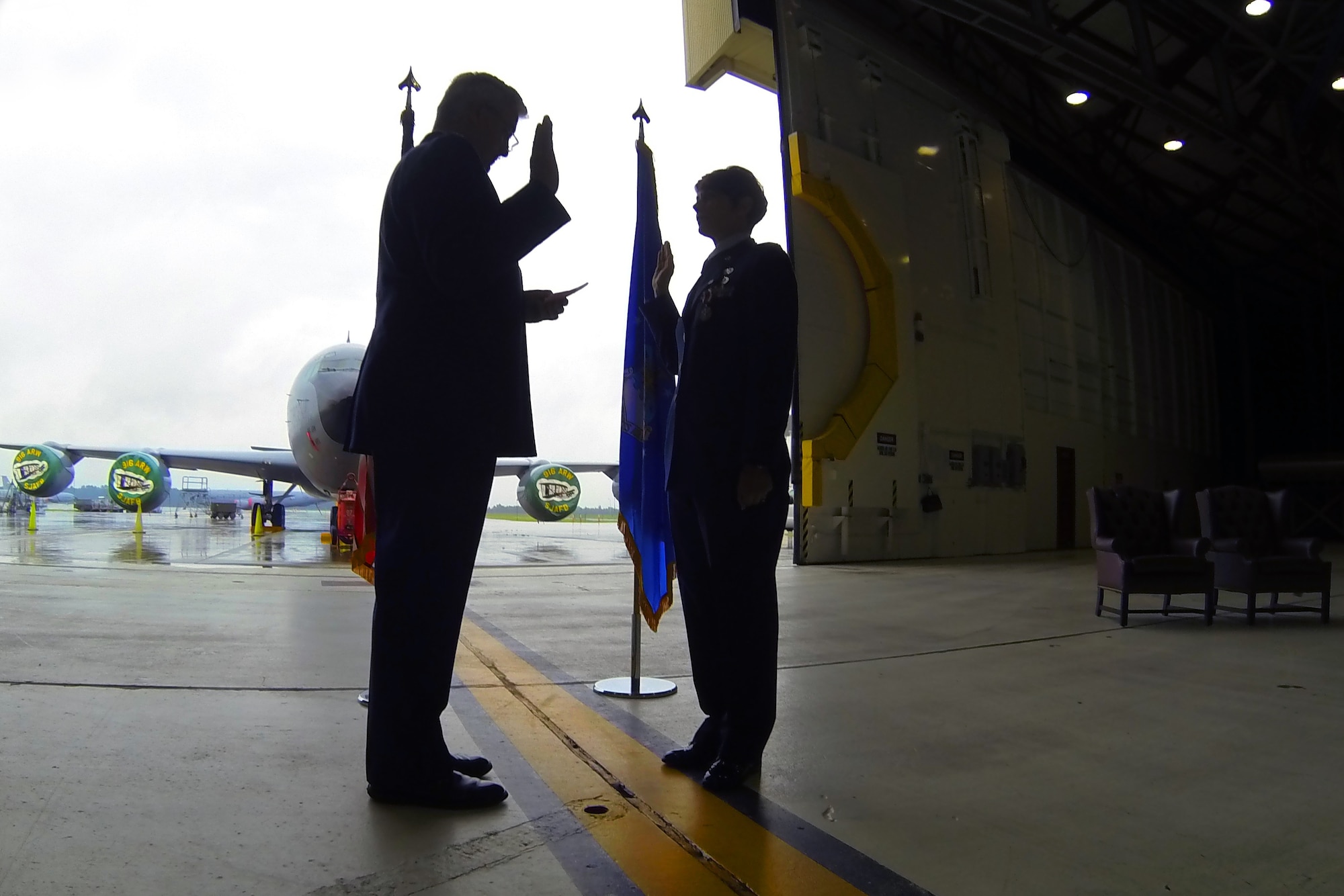 Col. Christine Schlacter, IMA to the Director, Operational Capability Requirements (AF/A5R), Pentagon, is promoted in a ceremony officiated by Col. Kenneth Bunting, 916th Maintenance Group commander, Aug. 2014. (U.S. Air Force photo by Master Sgt. Wendy Lopedote)