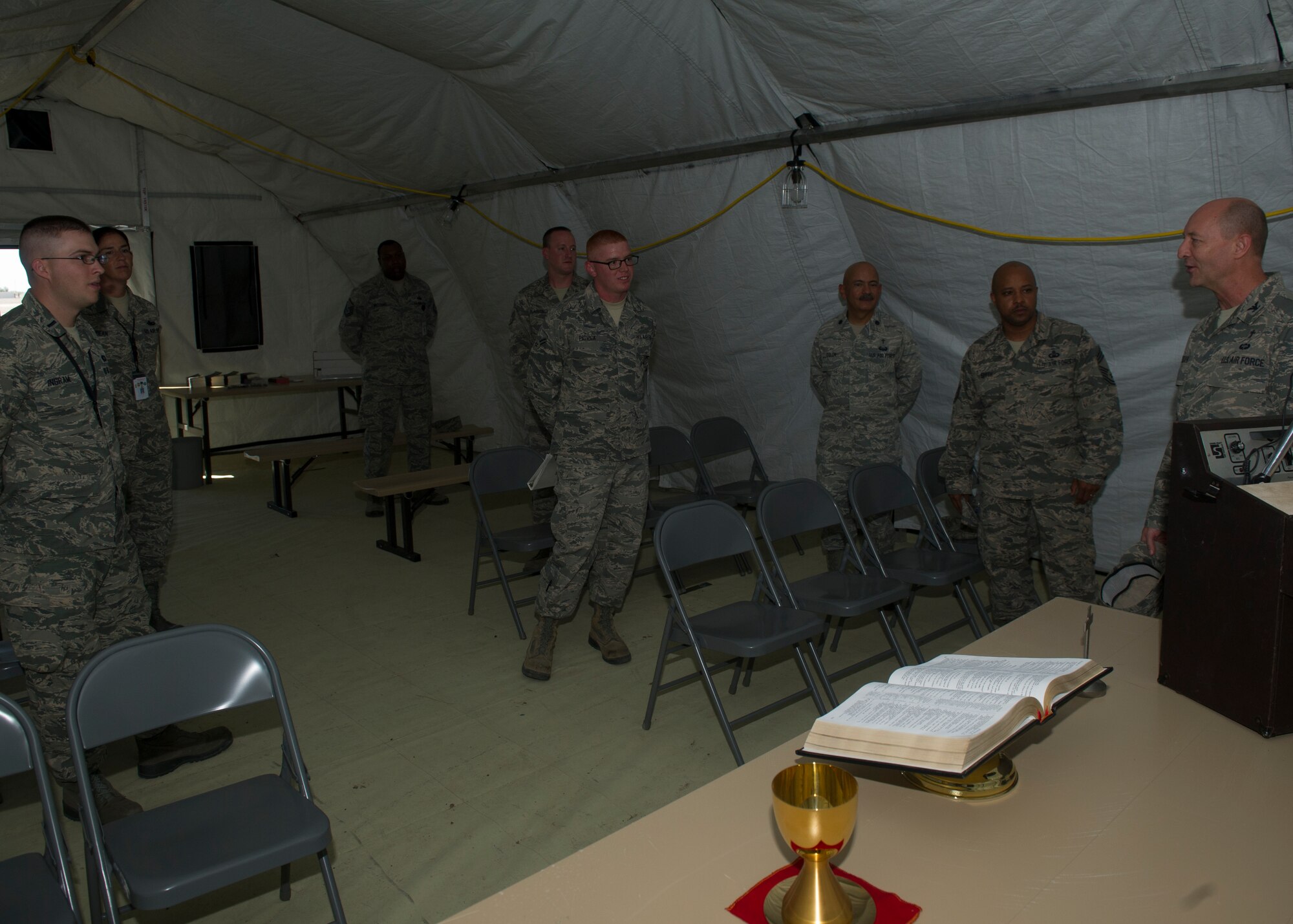 Colonel Scott Ofsdahl, Air Combat Command chaplain, tours the Deployable Chapel outside of the 49th Materiel Maintenance Squadron during his three-day visit ensuring the well-being of Holloman chaplains and their fellow Airmen at Holloman Air Force Base, N.M., Aug. 19. During his time here Ofsdahl reviewed chapel programs and had time to interview with each chaplain to ensure proper spiritual support is readily available for all Team Holloman members. The deployable chapel seats 50-75 personnel at any given time. (U.S. Air Force photo by Airman 1st Class Chase Cannon/Released)