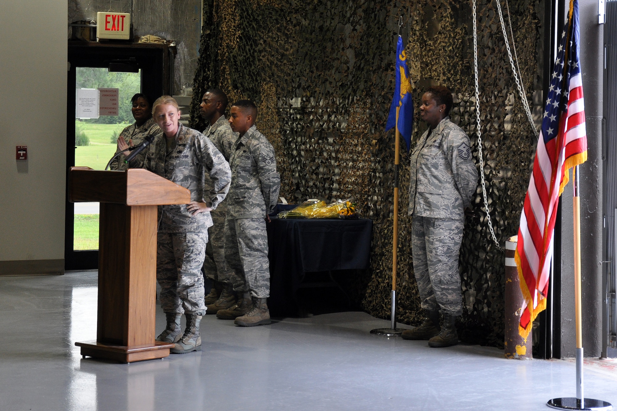 Maj. Kristin Brockshus, 916th Logistics Readiness Squadron commander, addresses the audience at the 916th LRS Assumption of Command ceremony, Aug. 2014. (U.S. Air Force photo by Staff Sgt. Alan Abernethy)