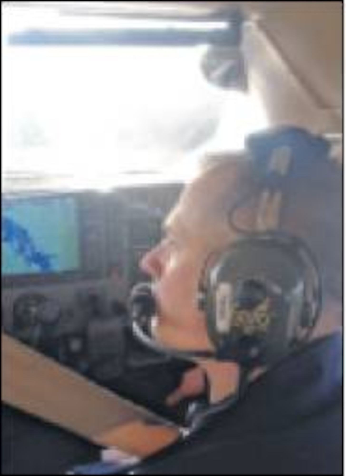 Geiss works one of three CAP photo missions he flew following Hurricane Sandy. (Civil Air Patrol photo by 1st Lt. Mark Patrick)