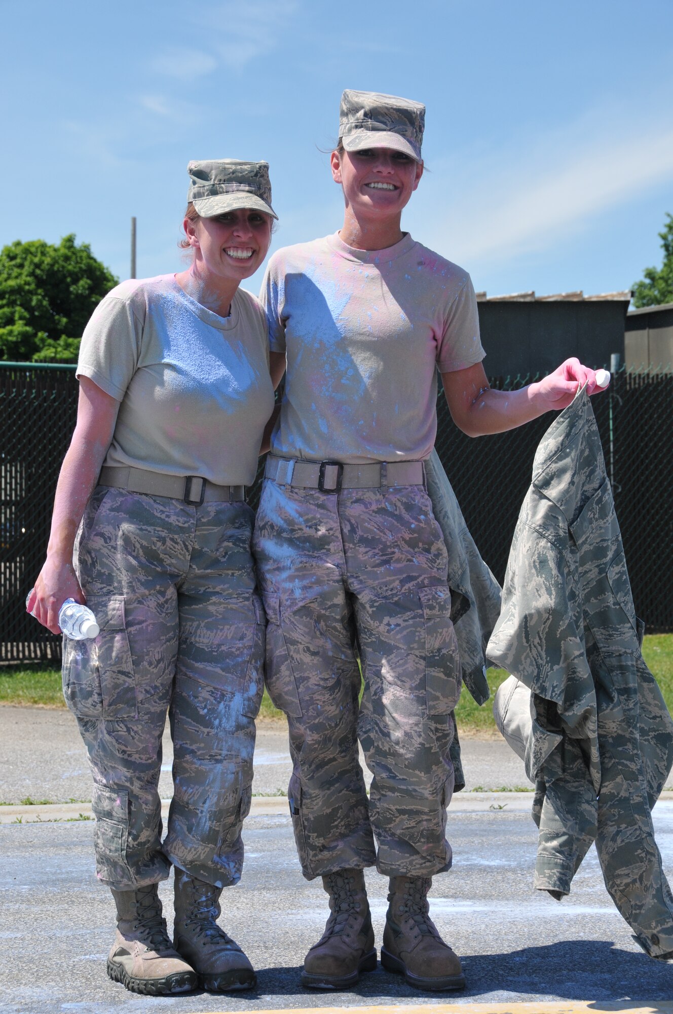 179th Airlift Wing members, Ohio National Guard, volunteer during the Color Fun 5k at the 179th Airlift Wing, Mansfield, OH, June 7, 2014. The Spring into Summer event was to help prepare Airman and their families for any event including deployment. (U.S. Air National Guard Photo by TSgt Joseph Harwood \Released))