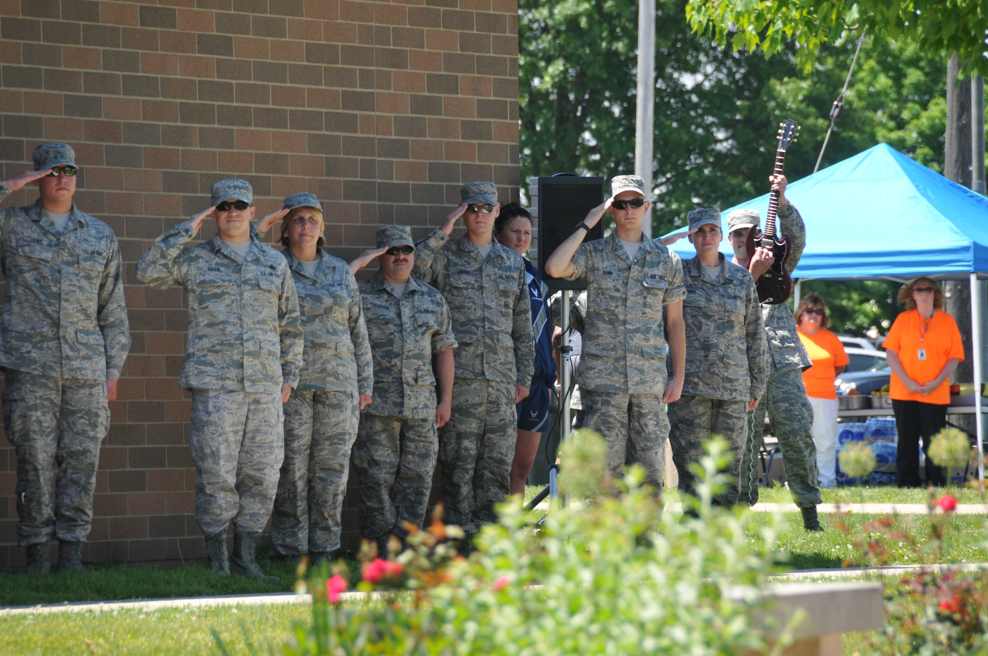 Major General Mark Bartman, Assistant Adjutant General-Air, Ohio National Guard, visits during the Color Fun 5k at the 179th Airlift Wing, Mansfield, OH, June 7, 2014. Maj. Gen. Bartman helped in presenting awards to individuals for involvement in the Airman and Family Readiness Center prior to the start of the 5k run. Prior to the start of the 5k, SSgt Gabriel Almeda played the national anthem on an electric guitar. (U.S. Air National Guard Photo by TSgt Joseph Harwood \Released)