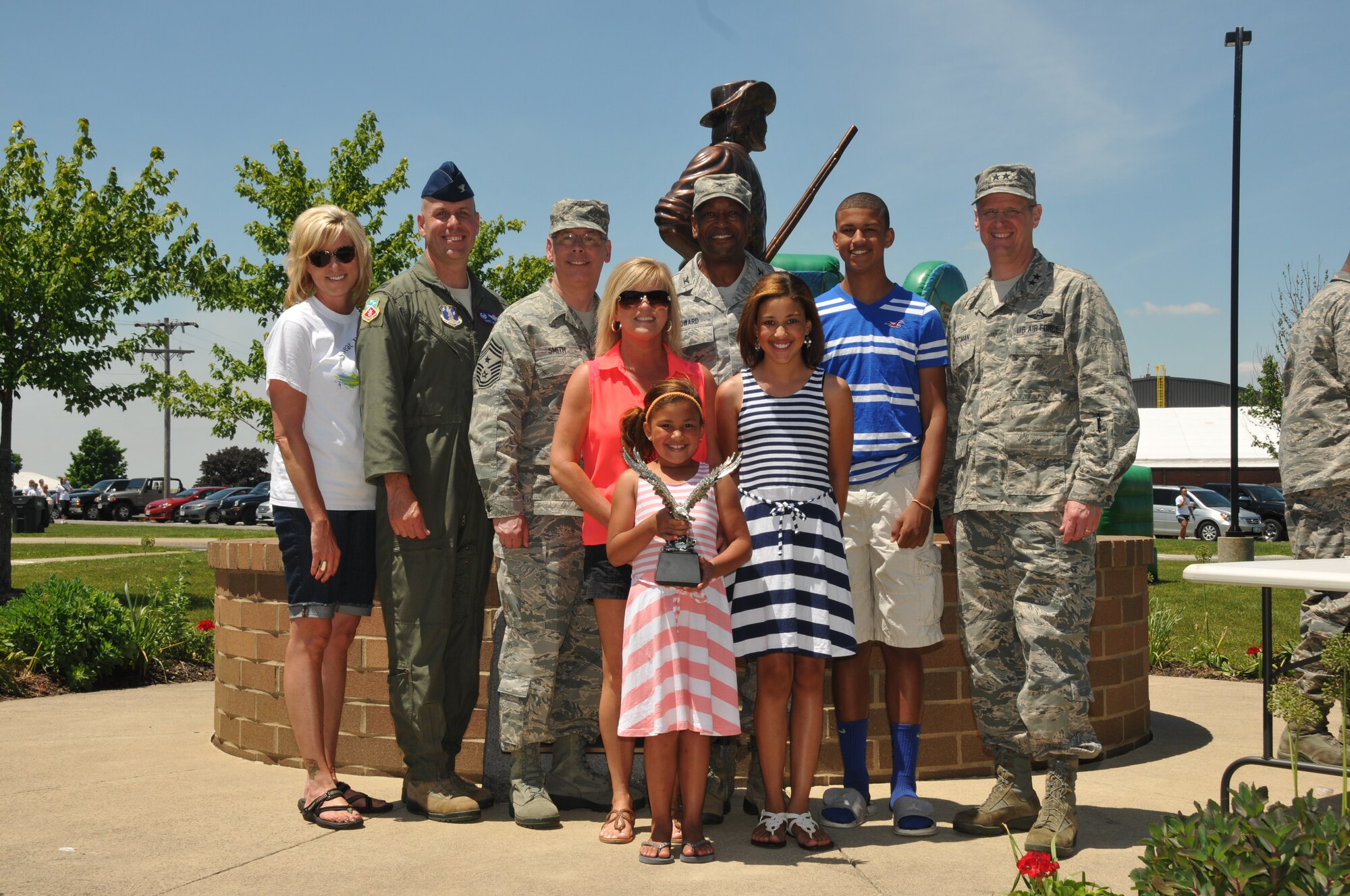 Major General Mark Bartman, Assistant Adjutant General-Air, Ohio National Guard, visits during the Color Fun 5k at the 179th Airlift Wing, Mansfield, OH, June 7, 2014. Maj. Gen. Bartman helped in presenting awards to individuals for involvement in the Airman and Family Readiness Center prior to the start of the 5k run. Prior to the start of the 5k, SSgt Gabriel Almeda played the national anthem on an electric guitar. (U.S. Air National Guard Photo by TSgt Joseph Harwood \Released)