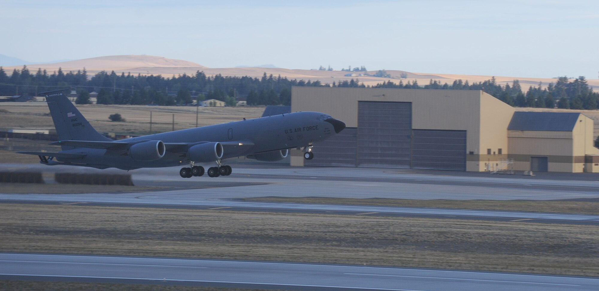 A KC-135 Stratotanker takes off during an operational readiness exercise at Fairchild Air Force Base, Washington, Aug. 22, 2014. The Wing Inspection Team-planned exercise allowed 92nd and 141st Air Refueling Wing Total Force Integration units to test and evaluate their capabilities to provide responsive aerial refueling and operational support for the full range of military missions worldwide. (U.S. Air Force photo by Staff Sgt. Samantha Krolikowski/Released)