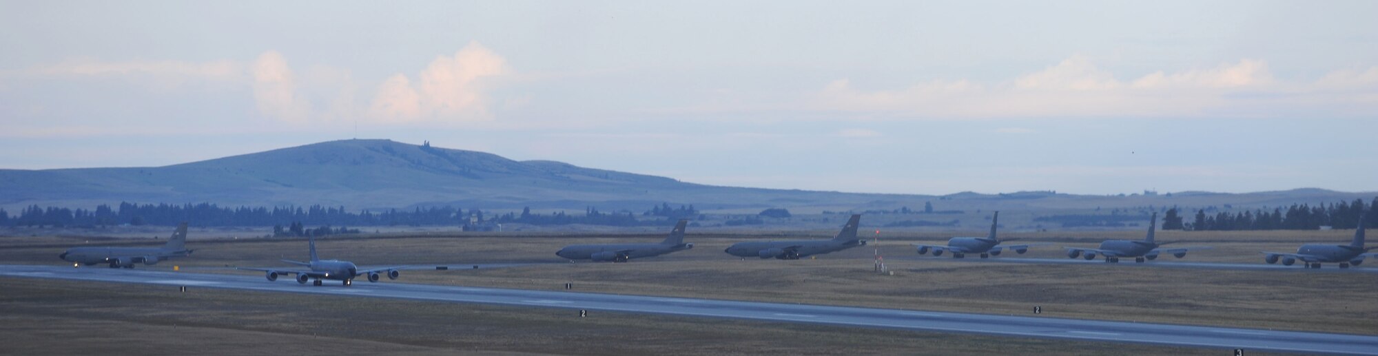 Team Fairchild KC-135 Stratotankers taxi to the runway during an operational readiness exercise at Fairchild Air Force Base, Washington, Aug. 22, 2014. The Wing Inspection Team-planned exercise allowed 92nd and 141st Air Refueling Wing Total Force Integration units to test and evaluate their capabilities to provide responsive aerial refueling and operational support for the full range of military missions worldwide. (U.S. Air Force photo by Staff Sgt. Samantha Krolikowski/Released)