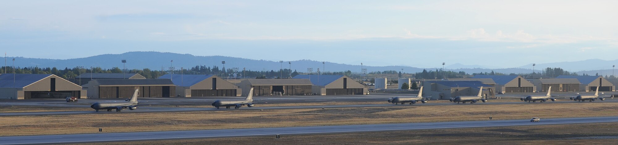 Team Fairchild KC-135 Stratotankers taxi to the runway during an operational readiness exercise at Fairchild Air Force Base, Washington, Aug. 22, 2014. The Wing Inspection Team-planned exercise allowed 92nd and 141st Air Refueling Wing Total Force Integration units to test and evaluate their capabilities to provide responsive aerial refueling and operational support for the full range of military missions worldwide. (U.S. Air Force photo by Staff Sgt. Samantha Krolikowski/Released)