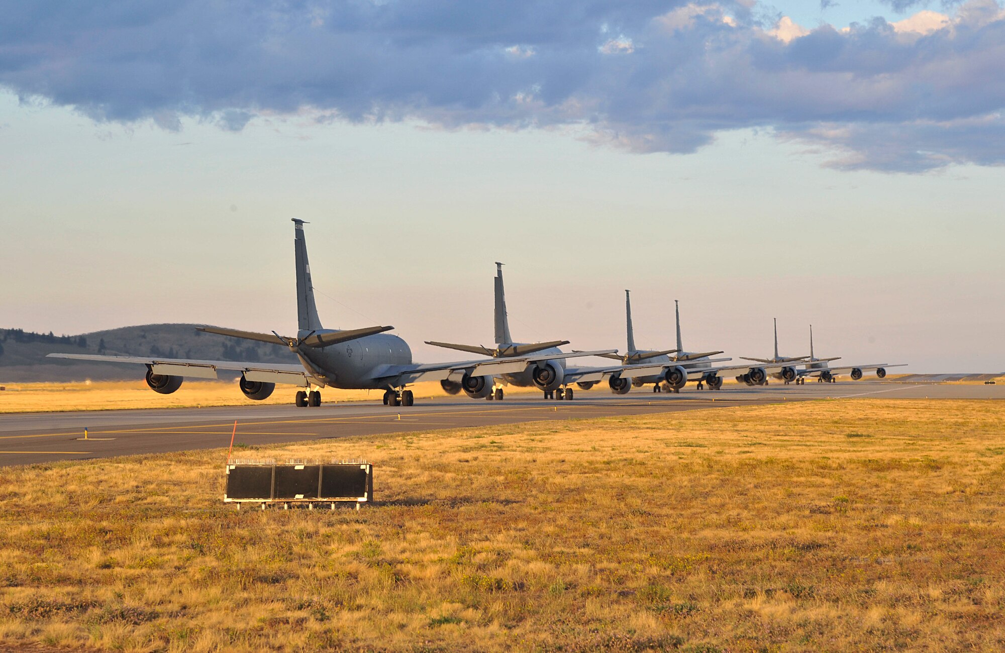 KC-135 Stratotankers from the 92nd and 141st Air Refueling Wings line up in preparation for take-off during an operational readiness exercise at Fairchild Air Force Base, Washington, Aug. 22, 2014. The Wing Inspection Team-planned exercise allowed the Total Force Integration units to test and evaluate their capabilities providing responsive aerial refueling and operational support for the full range of military missions worldwide. (U.S. Air Force photo by Senior Airman Mary O’Dell/Released)