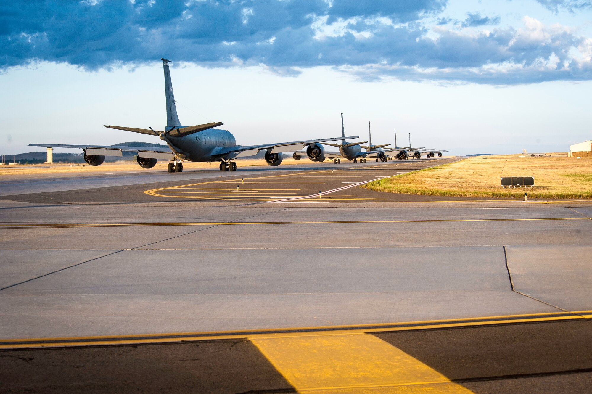 Team Fairchild KC-135 Stratotankers taxi to the runway during an operational readiness exercise at Fairchild Air Force Base, Washington, Aug. 22, 2014. The Wing Inspection Team-planned exercise allowed 92nd and 141st Air Refueling Wing Total Force Integration units to test and evaluate their capabilities to provide responsive aerial refueling and operational support for the full range of military missions worldwide. (U.S. Air Force photo by Staff Sgt. Benjamin W. Stratton/Released)