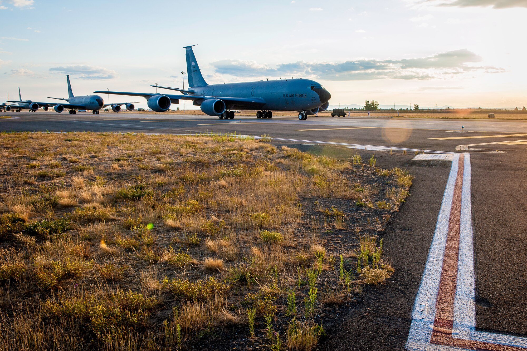 Team Fairchild KC-135 Stratotankers taxi to the runway during an operational readiness exercise at Fairchild Air Force Base, Washington, Aug. 22, 2014. The Wing Inspection Team-planned exercise allowed 92nd and 141st Air Refueling Wing Total Force Integration units to test and evaluate their capabilities to provide responsive aerial refueling and operational support for the full range of military missions worldwide. (U.S. Air Force photo by Staff Sgt. Benjamin W. Stratton/Released)