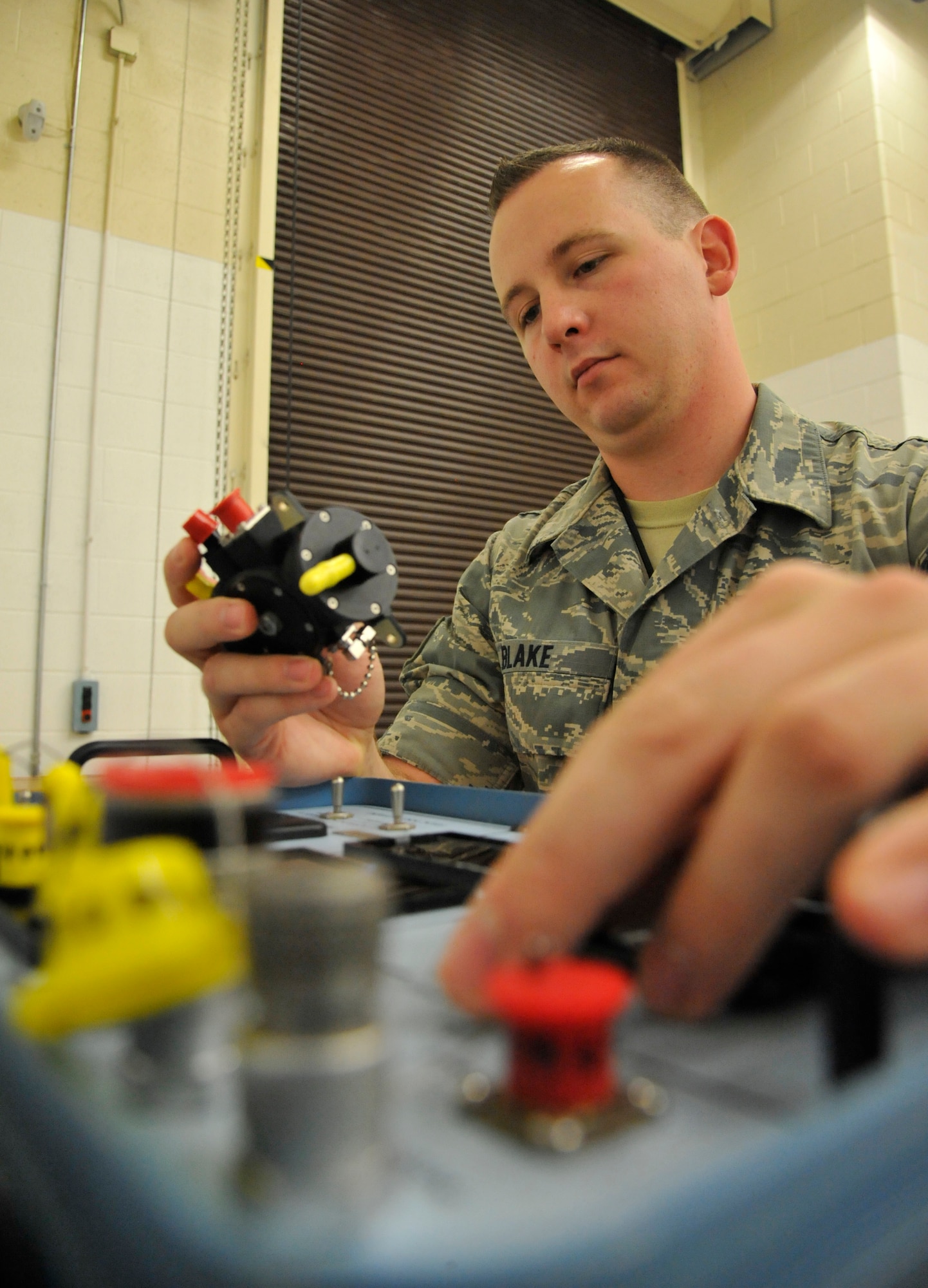 U.S. Air Force Staff Sgt. Paul Blake, 509th Maintenance Squadron egress systems supervisor, performs environmental sensor test Aug. 5, 2014 at Whiteman Air Force Base, Missouri. The environmental sensor is used to accurately read aircraft airspeeds and altitudes. Whiteman’s egress shop receives vital assistance multiple units on base including the electrical environmental shop and the aircrew flight equipment shop. (U.S. Air Force photo by Airman 1st Class Keenan Berry/Released)
