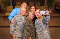 Secretary of the Air Force Deborah Lee James takes time out during her busy day of briefings Aug. 21 to snap a selfie with a group of Air Force Reserve Command annual award winners at Robins Air Force Base. From left are Tech. Sgt. Ricky Smith, Philip Patisaul, James, Debra Garcia and Master Sgt. Chad Wagner. (U.S. Air Force photo by Tommie Horton) 