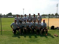Moody's Flying Tigers softball team competed in the 2014 United States Specialty Sports Association Military World's tournament in Panama City Beach, Fla., Aug. 14 to 17, 2014.  The Flying Tigers competed in the varsity B bracket with 31 other teams all playing for the title of best military softball team in the Department of Defense. Back row, from left: Master Sgt. Terry Beasley, Capt. Chris Daniels, Master Sgt. Chris Souza, Senior Airman Joseph Raby, Larry McEntire, and 1st Lt. Jonathan Plyler. Front row, from left: Staff Sgt. Daniel Wiggins, Staff Sgt. Ronrico Campbell, Staff Sgt. Jonathan Gasparetto, Lt. Col. Chris Jones, Senior Airman Jeremy Johnson, 1st Michael Root, and Senior Airman Mark Melchiori.  (Courtesy photo)
