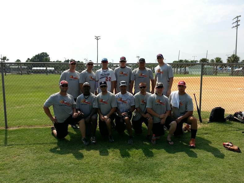 Moody's Flying Tigers softball team competed in the 2014 United States Specialty Sports Association Military World's tournament in Panama City Beach, Fla., Aug. 14 to 17, 2014.  The Flying Tigers competed in the varsity B bracket with 31 other teams all playing for the title of best military softball team in the Department of Defense. Back row, from left: Master Sgt. Terry Beasley, Capt. Chris Daniels, Master Sgt. Chris Souza, Senior Airman Joseph Raby, Larry McEntire, and 1st Lt. Jonathan Plyler. Front row, from left: Staff Sgt. Daniel Wiggins, Staff Sgt. Ronrico Campbell, Staff Sgt. Jonathan Gasparetto, Lt. Col. Chris Jones, Senior Airman Jeremy Johnson, 1st Michael Root, and Senior Airman Mark Melchiori.  (Courtesy photo)
