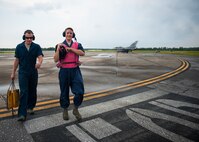 End-of-runway Airmen leave the flight line after the inspection of an F-16 Fighting Falcon at Eglin Air Force Base, Fla., Aug. 7.  The 96th Maintenance Group’s end-of-runway crew is the initial and final set of eyes to examine 53rd Wing and 96th Test Wing aircraft before takeoff and upon arrival. (U.S. Air Force photo/Tech. Sgt. Jasmin Taylor)
