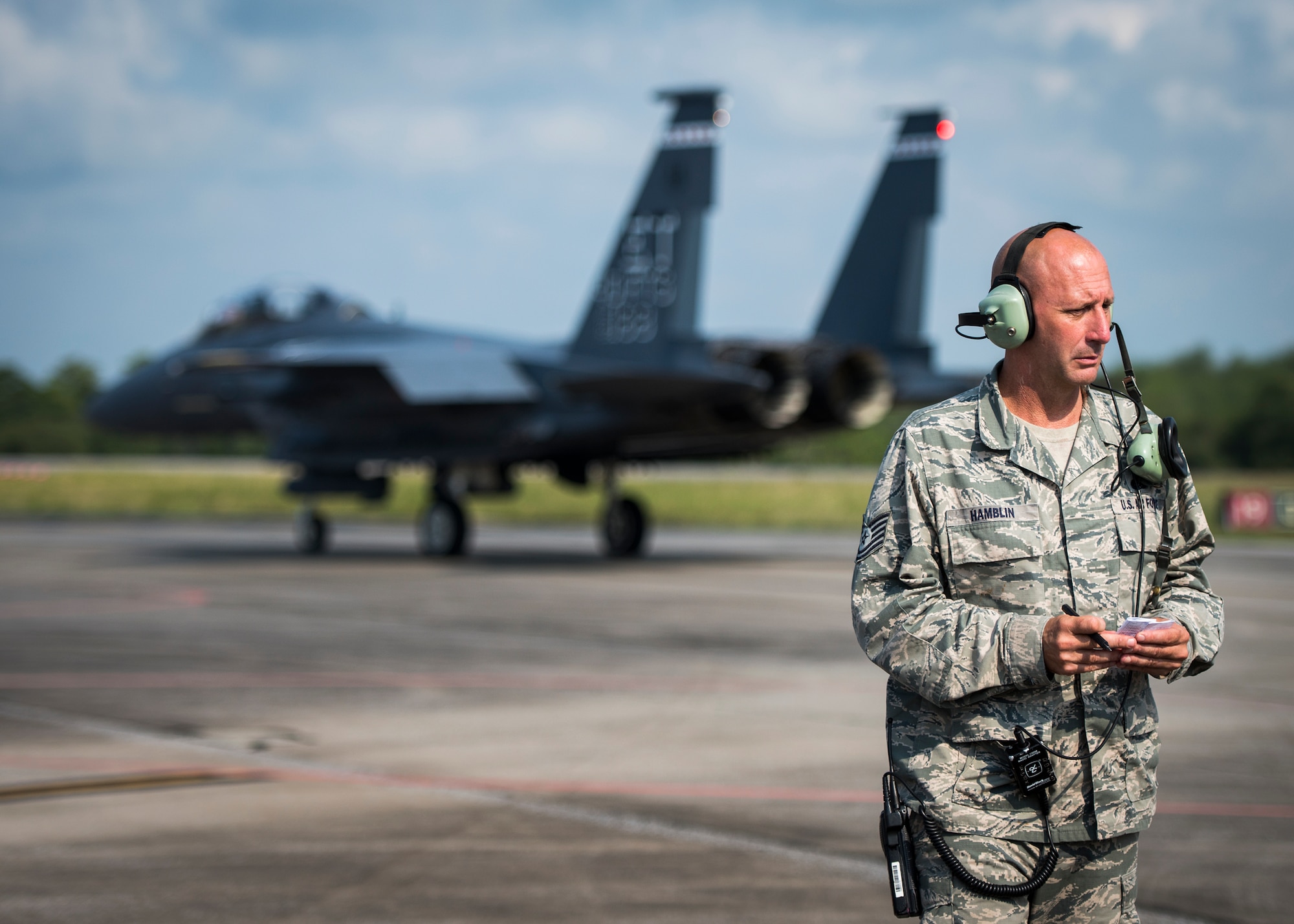 Tech. Sgt. Arthur Hamblin, 96th Aircraft Maintenance Squadron, checks his list after inspection at Eglin Air Force Base, Fla., Aug. 7.  The 96th Maintenance Group’s EOR crew is responsible for checking each aircraft for leaks, loose parts or any damage to the tires or aircraft before takeoffs and landings. (U.S. Air Force photo/Tech. Sgt. Jasmin Taylor)