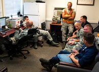 The end-of-runway crew takes a break in a tiny building at the end of the flight line at Eglin Air Force Base, Fla., Aug. 7.  The 96th Maintenance Group’s EOR crew is responsible for checking each aircraft for leaks, loose parts or any damage to the tires or aircraft before takeoffs and landings. (U.S. Air Force photo/Tech. Sgt. Jasmin Taylor)