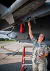 Staff Sgt. Lena Bleckley, 96th Aircraft Maintenance Squadron, arms the weapons at Eglin Air Force Base, Fla., Aug. 7.  The 96th Maintenance Group’s end-of-runway weapons crew is responsible for removing the safety pins from the jet’s munitions prior to take off and replacing them upon arrival. (U.S. Air Force photo/Tech. Sgt. Jasmin Taylor)