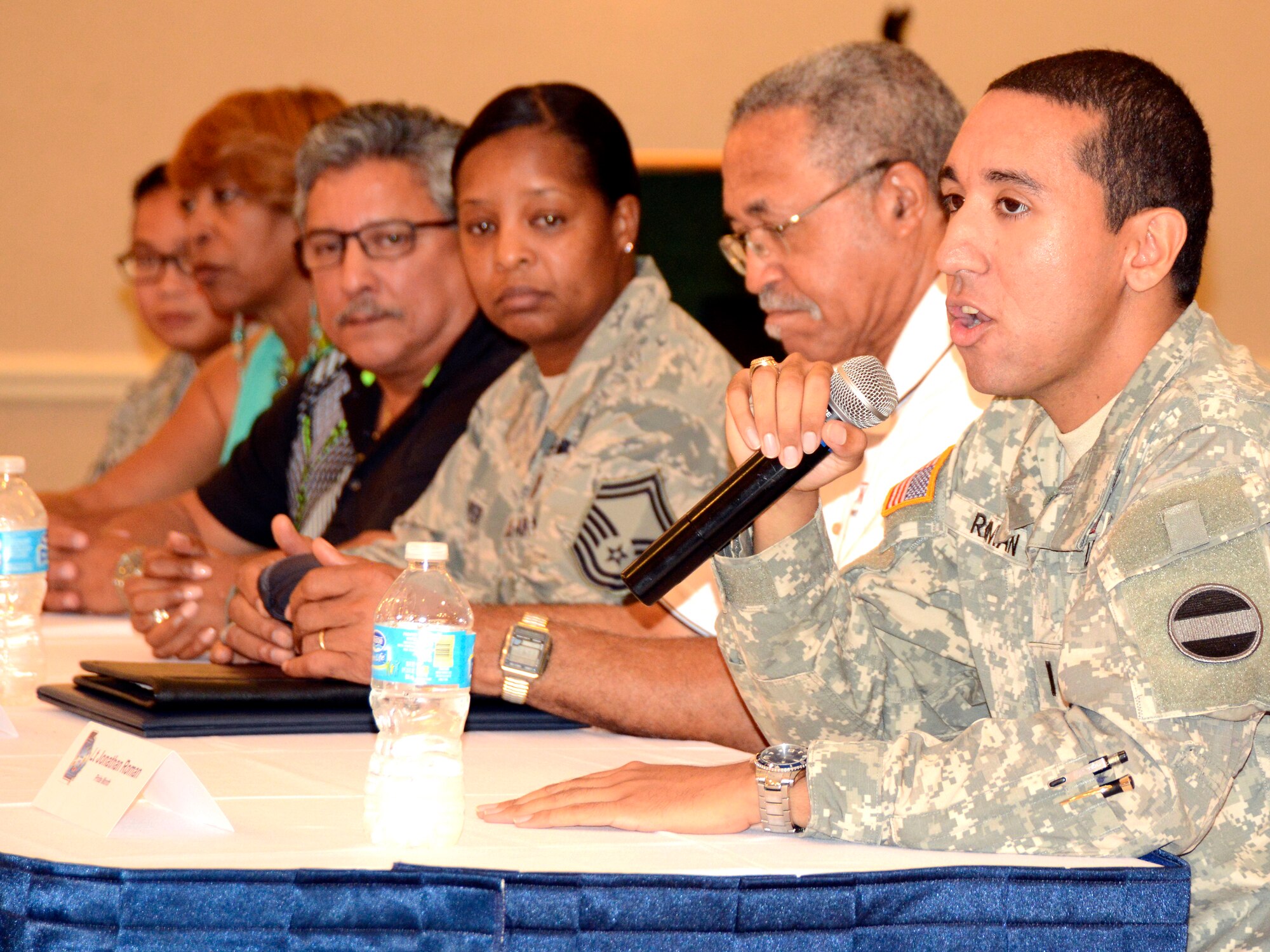 Panelists answer audience questions during the Robins Diversity Month panel discussion, August 20, 2014, at the Heritage Club. (U. S. Air Force photo by Ed Aspera)