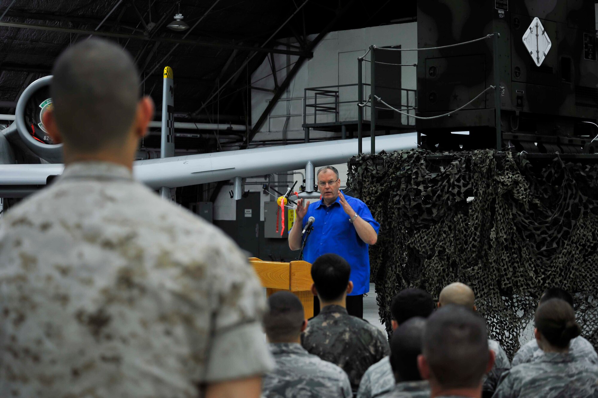 Deputy Secretary of Defense Bob Work answers a service member’s question asked during a troop event at Osan Air Base, Republic of Korea, Aug. 21, 2014. Work visited Osan for two days. (U.S. Air Force photo/Senior Airman David Owsianka)
