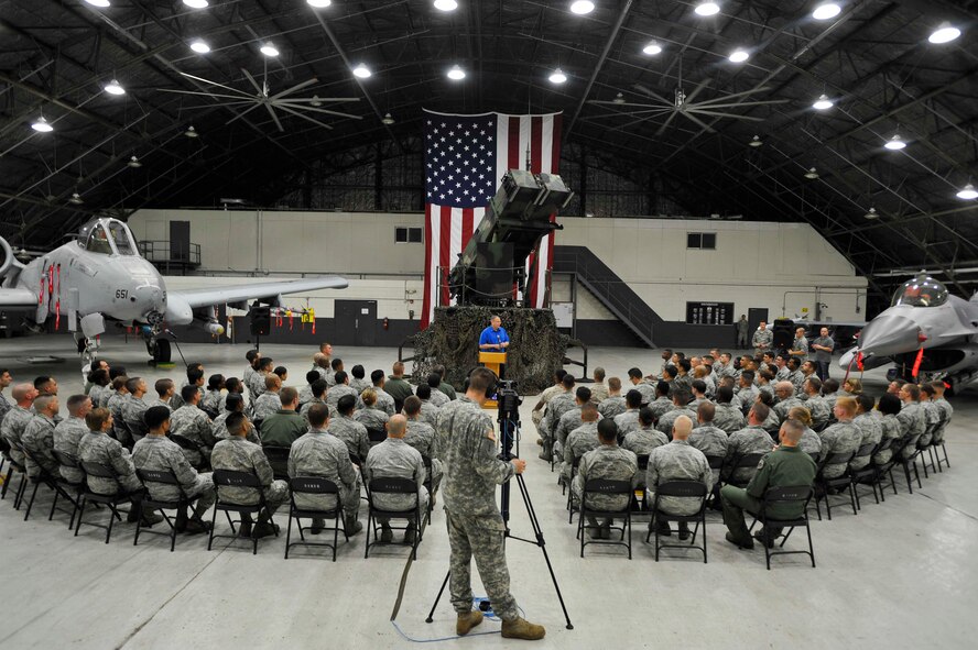 Deputy Secretary of Defense Bob Work talks to service members during a troop event at Osan Air Base, Republic of Korea, Aug. 21, 2014. Work then opened the floor to questions and coined Airmen after the event. (U.S. Air Force photo by Senior Airman David Owsianka/Released) 