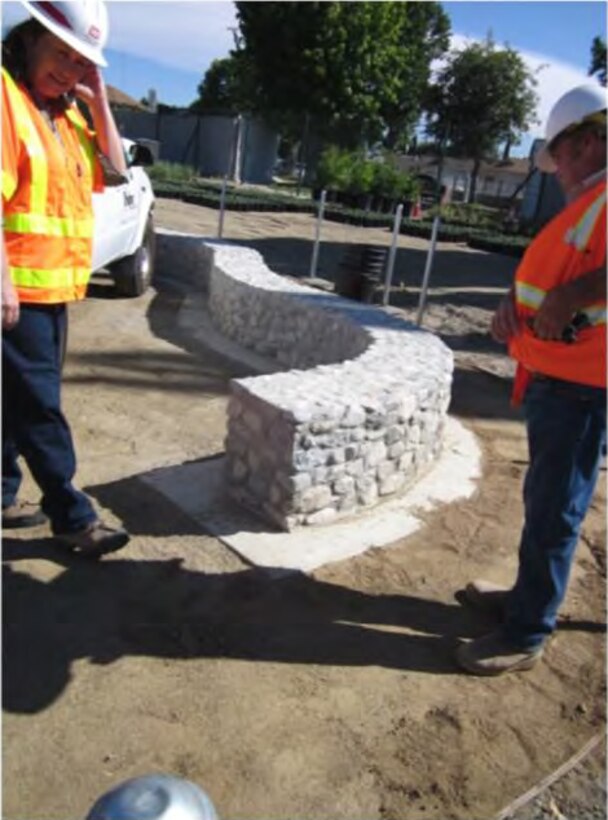 Sandra Willis (left), the USACE 2014 Landscape Architect of the Year, inspects the stone seat wall and grading for pond and landscape berms at the Tujunga Wash Ecocycstem Restoration Porject.
