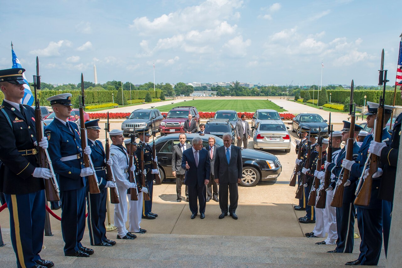 U.S. Defense Secretary Chuck Hagel, left, hosts an honor cordon for Greek Defense Minister Dimitris Avramopoulos at the Pentagon, Aug. 21, 2014. DoD photo by U.S. Navy Petty Officer 2nd Class Sean Hurt