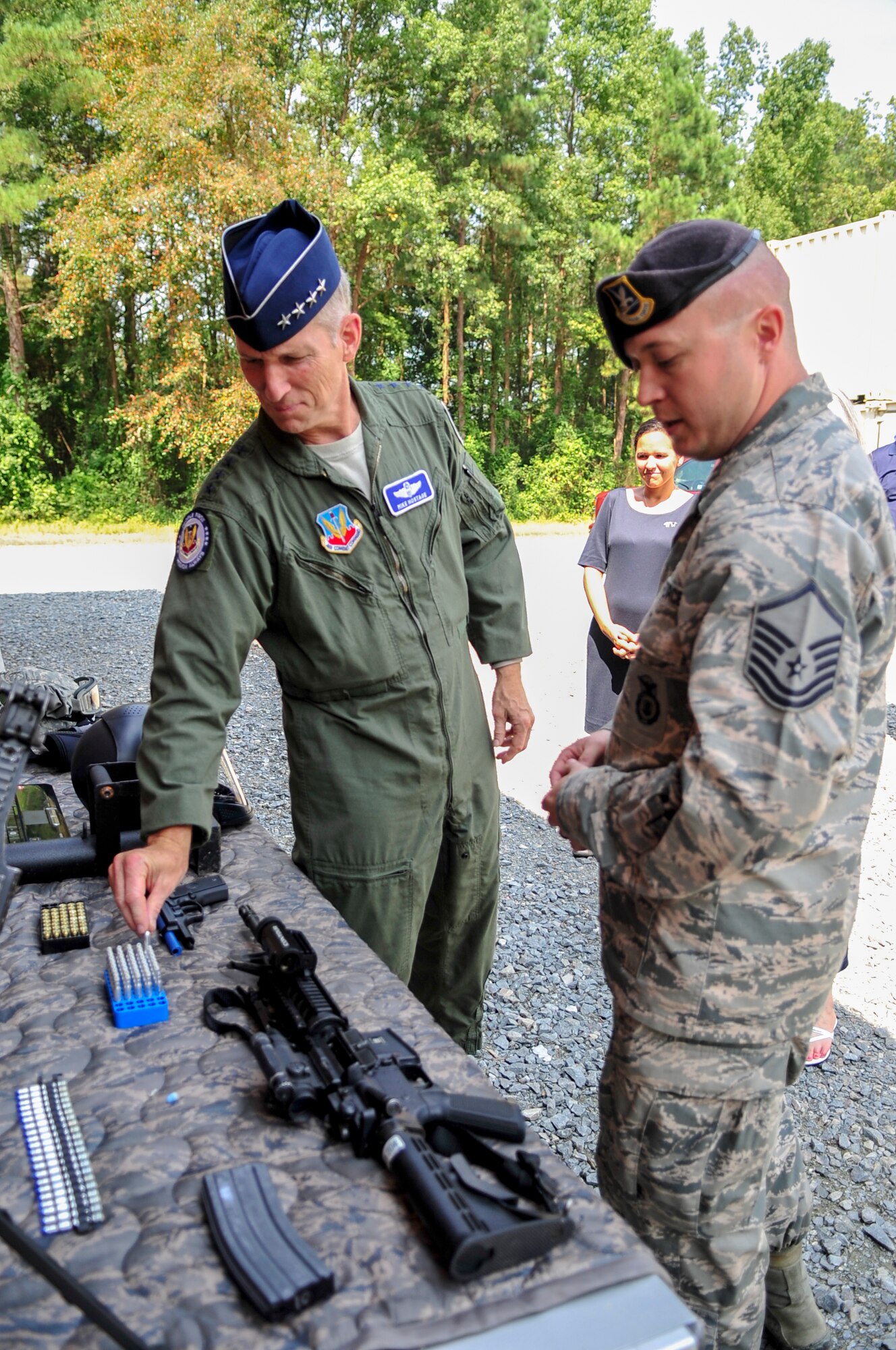 Master Sgt. Michael Smith, 4th Security Forces Squadron NCO in Charge of Security Forces Training, briefs Gen. Mike Hostage, commander of Air Combat Command, on close-quarter combat training at the active shooter training facility at Seymour Johnson Air Force Base, North Carolina, Aug. 21. Hostage took the time to discuss the issues on the minds of 4th Fighter Wing Airmen during his visit. (U.S. Air Force photo by Airman 1st Class Shawna Keyes/Released)