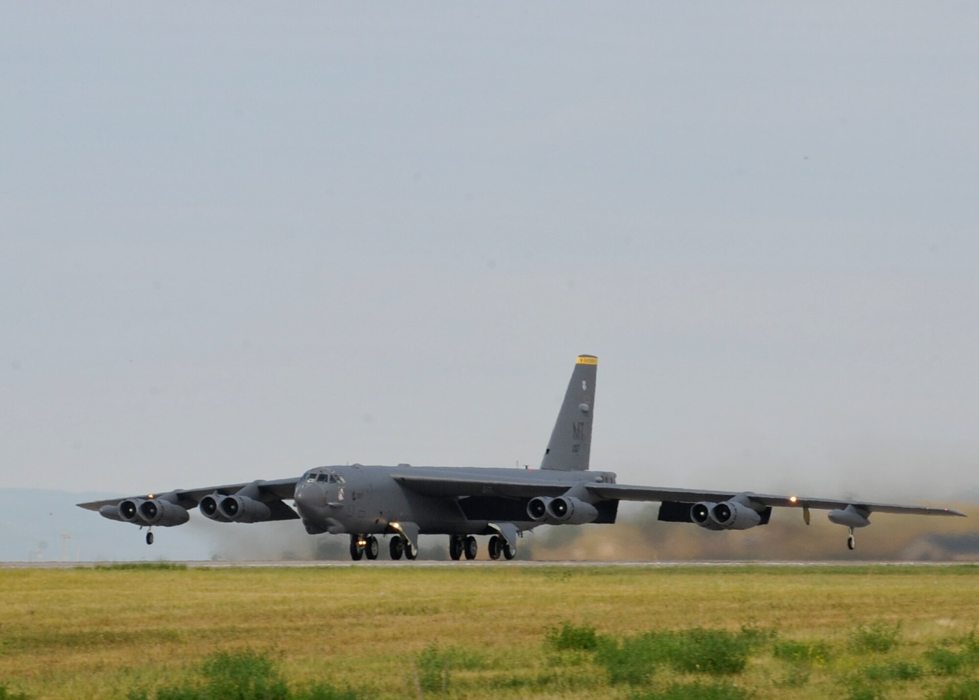A B-52 Stratofortress takes off Aug. 14, 2014, during a standoff weapons integration training exercise at Ellsworth Air Force Base, S.D. The week-long training consisted of B-52s and B-1B Lancers conducting simulated combat scenarios at the Powder River Training Complex, S.D. to help prepare for real-world contingencies. The B-52 is from Minot Air Force Base, N.D. (U.S. Air Force photo/Senior Airman Anania Tekurio)