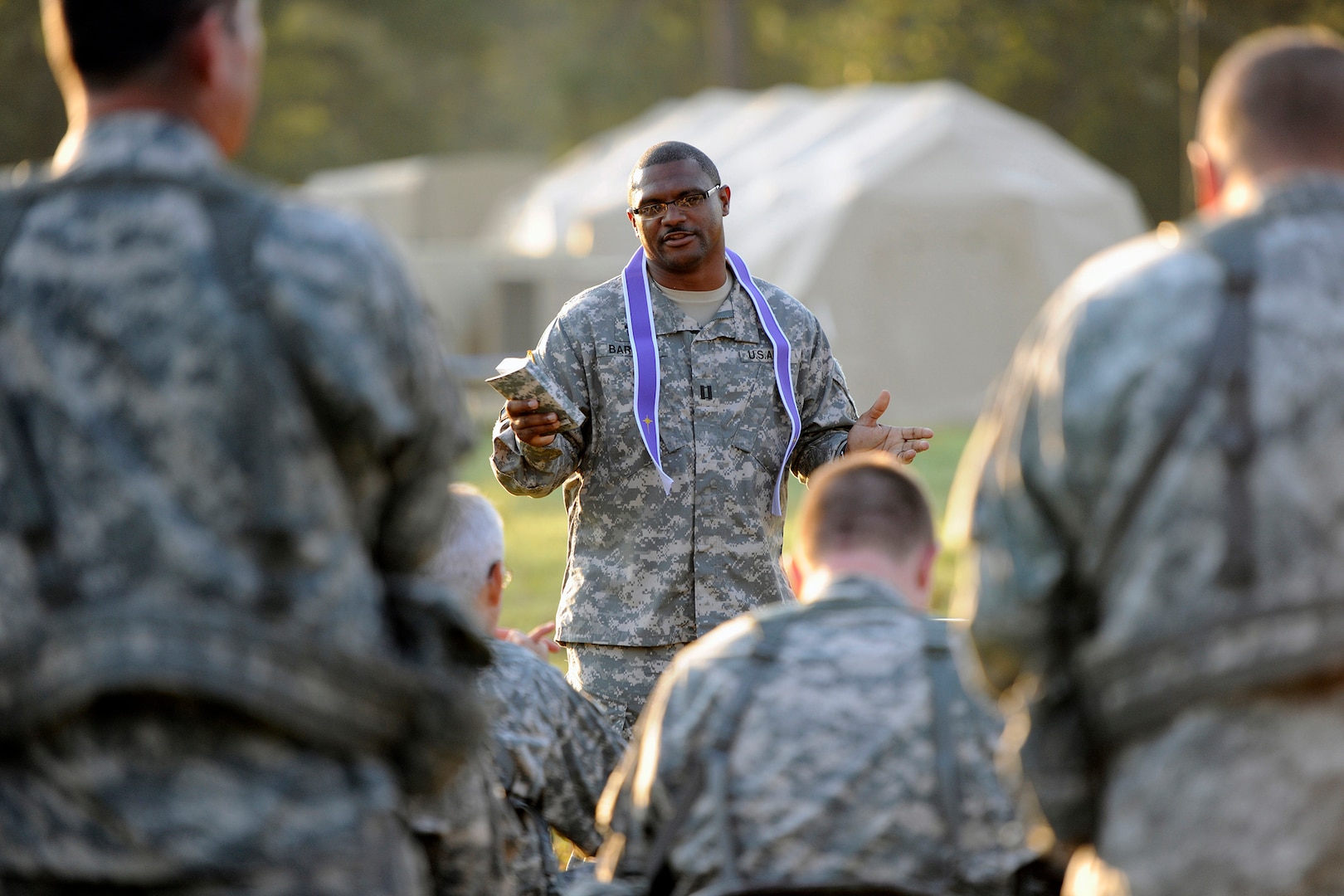 Army Capt. Antoine D. Barlow, a chaplain with the Mississippi Army National Guard’s 155th Heavy Brigade Combat Team, conducts chapel service during the unit's annual training at Camp Shelby Joint Forces Training Center, Mississippi, Aug. 12, 2012. Army National Guard chaplains not only act as spiritual and religious leaders for Soldiers, but are now involved with behavioral health and family support programs designed to aid Soldiers who may need additional assistance. 