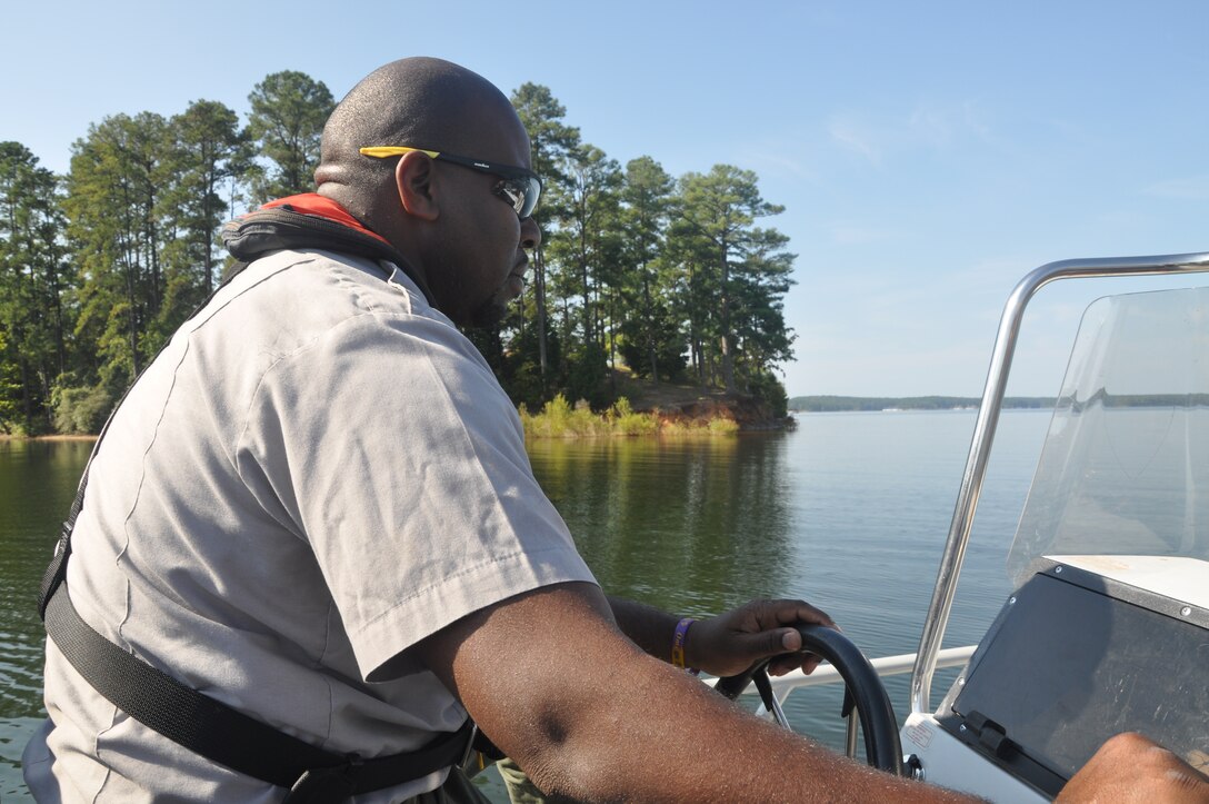 Park Ranger Roosevelt Pough III steers a ranger patrol boat at the U.S. Army Corps of Engineers' J. Strom Thurmond Lake in Clarks Hill, S.C.