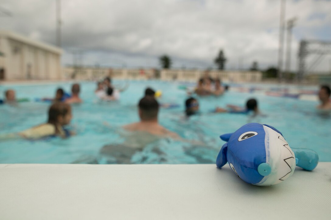 A water toy is left at the edge of the pool Aug. 13 at the Camp Hansen Aquatics Center. It was used in many of the games played by children with the Nagomi Nursery Home for Children and service members stationed at Camp Hansen. The day was filled with the service members and the children swimming, laughing and having fun. The Marines are with 3rd Battalion, 12th Marine Regiment, 3rd Marine Division, III Marine Expeditionary Force.