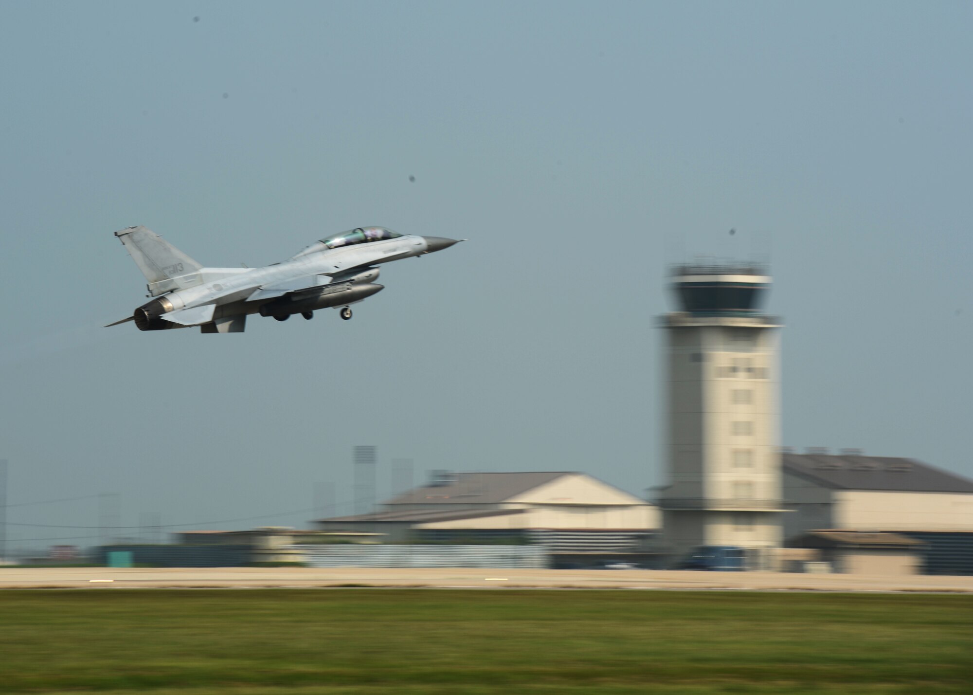 Republic of Korea Air Force F-16 Fighting Falcons from the 111th Fighter Squadron land at Kunsan Air Base, Republic of Korea, after a training mission Aug. 22, 2014. The ROKAF works with the 8th Operations Support Group to train, support and defend the region. (U.S. Air Force photo by Senior Airman Justyn M. Freeman/Released)