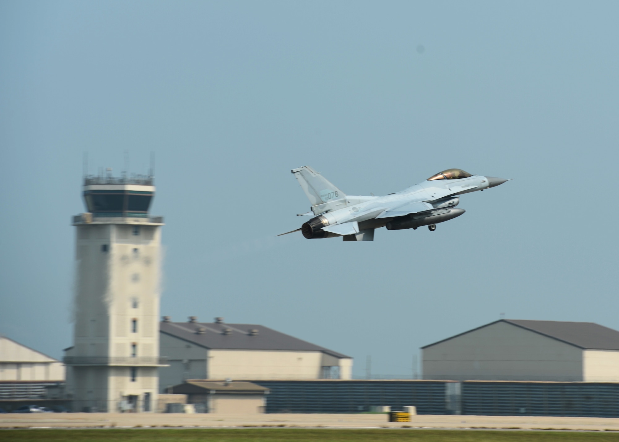 Republic of Korea Air Force F-16 Fighting Falcons from the 111th Fighter Squadron land at Kunsan Air Base, Republic of Korea, after a training mission Aug. 22, 2014. The ROKAF works with the 8th Operations Support Group to train, support and defend the region. (U.S. Air Force photo by Senior Airman Justyn M. Freeman/Released)