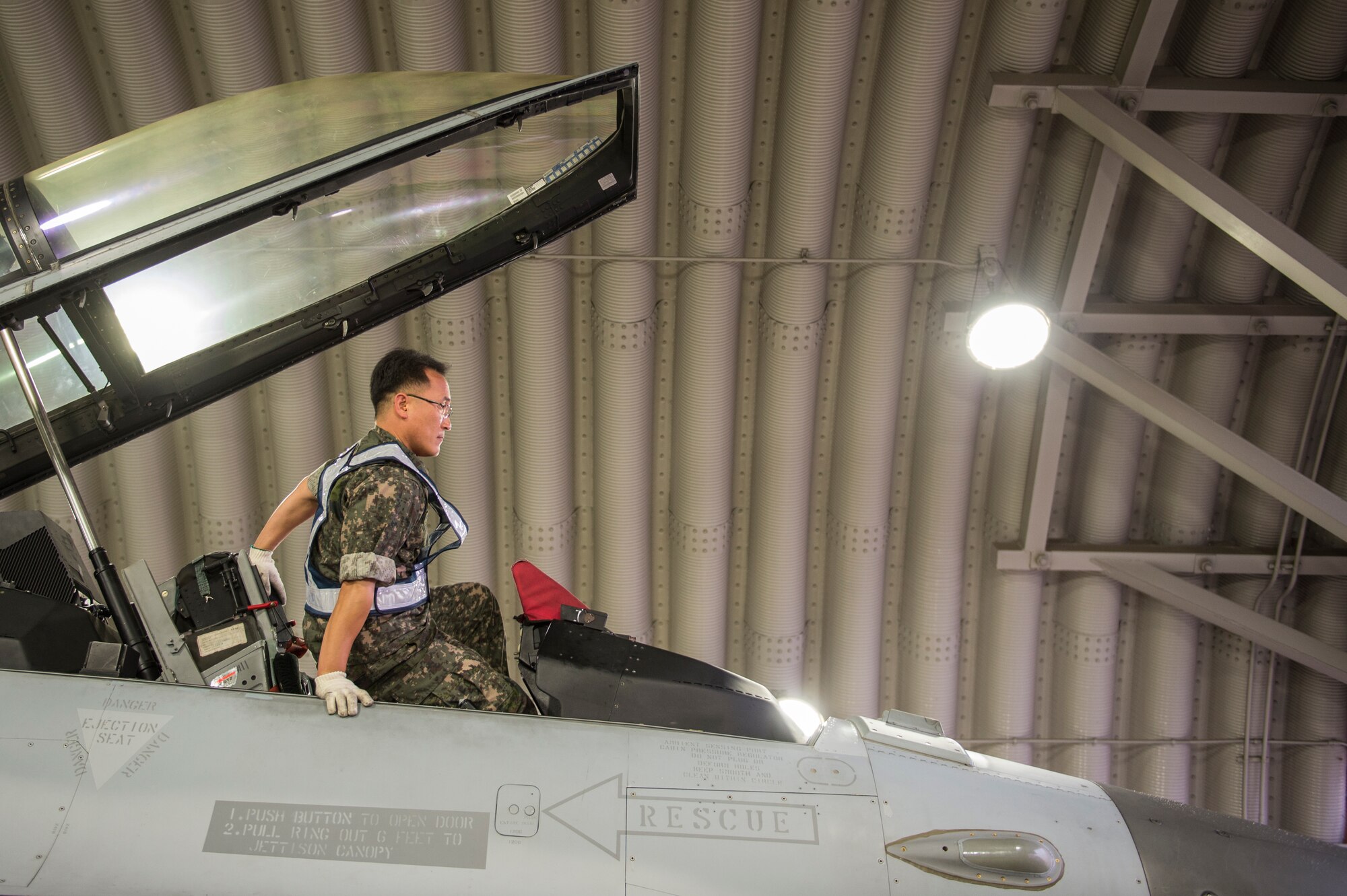 Republic of Korea Air Force F-16 Fighting Falcon maintainers from the 111th Fighter Squadron prepare the aircraft for a training mission at Kunsan Air Base, Republic of Korea, before a training mission Aug. 22, 2014. The ROKAF works with the 8th Operations Support Group to train and defend the region. (U.S. Air Force photo by Staff Sgt. Stephany Richards/ Released)