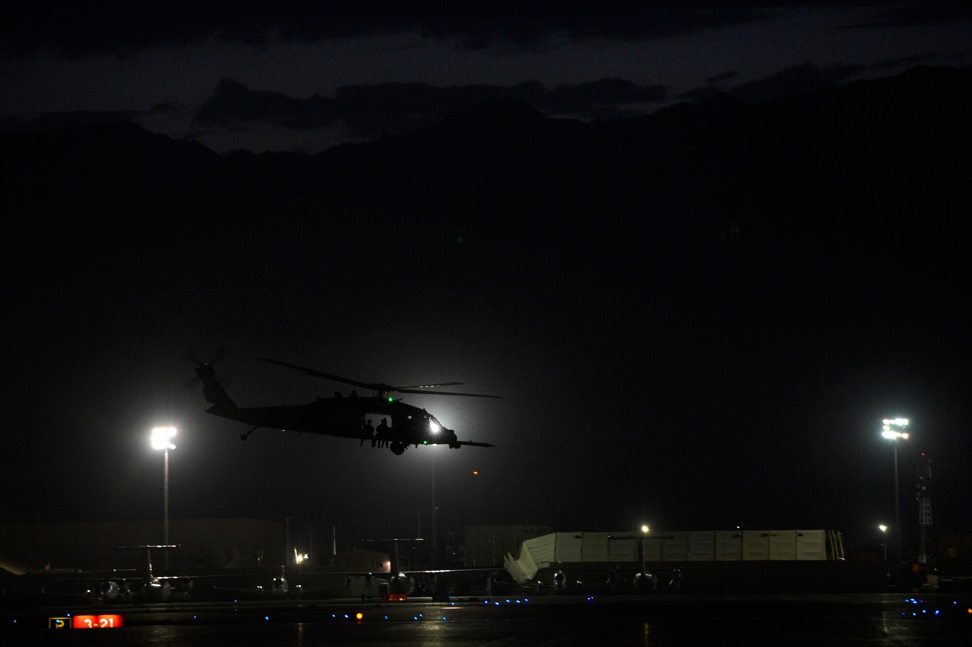 A Pararescue team takes off from Bagram Air Field Afghanistan, July 9, 2014 in an HH-60G Pave Hawk helicopter. Air Force PJs are the only DoD elite combat forces specifically organized, trained, equipped, and postured to conduct full spectrum Personnel Recovery to include both conventional and unconventional combat rescue operations. (U.S. Air Force photo by Senior Airman Sandra Welch/Released)