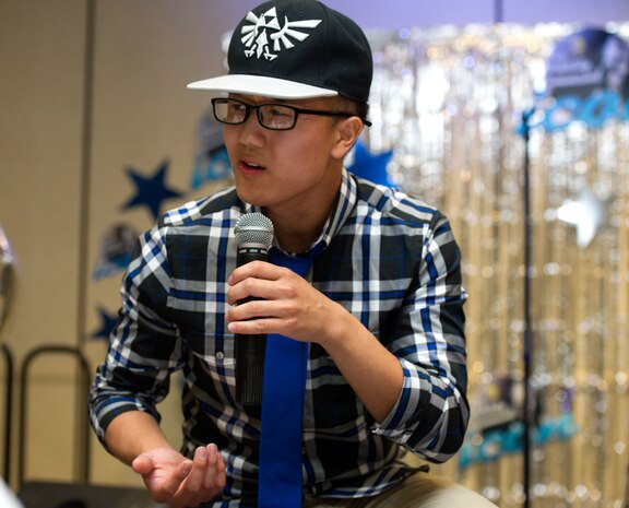 Touacha Her performs during Joint Base Charleston's AMC Icon competition Aug. 21, 2014, at the Charleston Club. Each major installation within AMC is conducting a base-level AMC Icon contest. The top placing active duty contestant from each installation will represent their installation in the AMC finals. AMC Icon is held each year to promote morale and healthy competition across the command. (U.S. Air Force photo/Staff Sgt. William O'Brien)